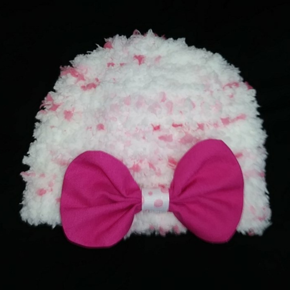 Hand knit baby girl hat with bow